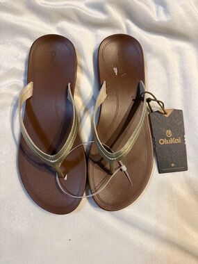 OluKai Women’s Brown Flip-Flop Sandals with Gold Straps